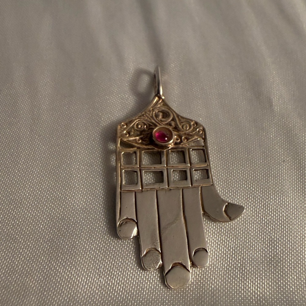 Elegant Silver Hamsa Pendant with Red Gemstone. Sterling silver.